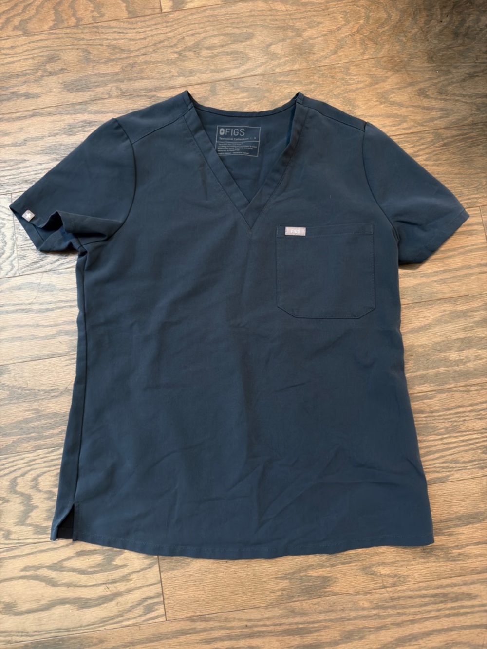FIGS Catarina one pocket scrub top in Dark Harbor